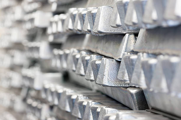 Stack of Aluminum ingots. Shallow depth of field.